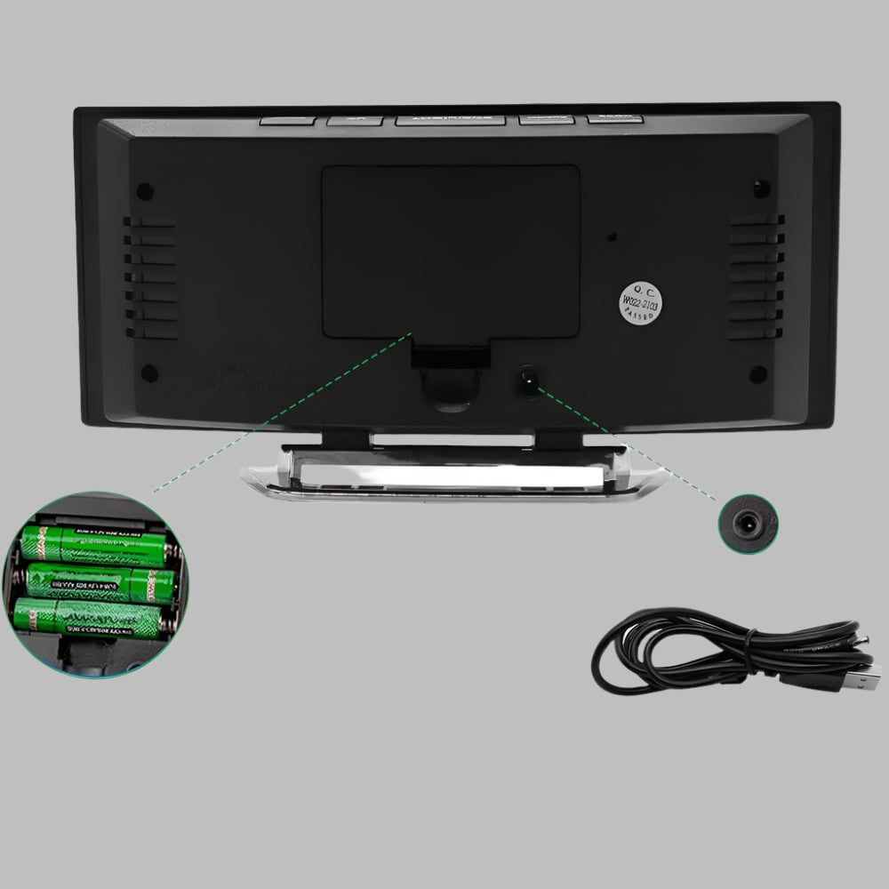 Modern bedroom alarm clock, digital with curved LED display and convenient snooze function.