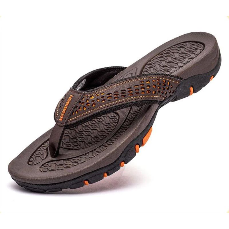 Unisex orthopedic slippers with soft, breathable material and corrective arch support.