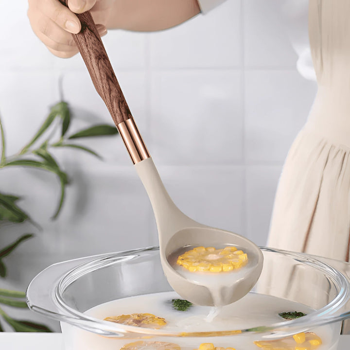 Durable silicone kitchen utensil set with wooden handles, designed for safe non-stick cooking & high-heat use.