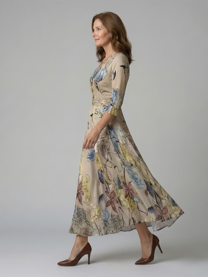 Woman enjoying spring in elegant floral cross wrap midi dress, casual yet stylish.