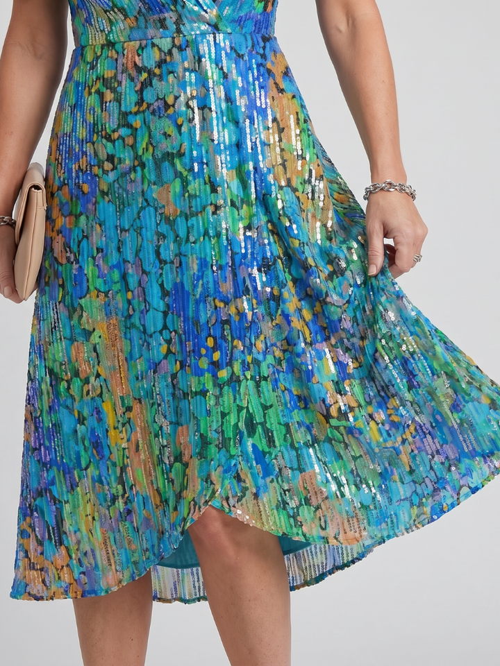 Comfortable & stylish women's floral midi dress, v-neck, flutter sleeves, perfect for everyday wear.