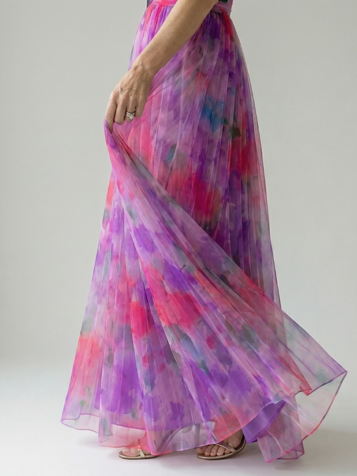 Women's vacation wrap maxi dress, sleeveless, soft, flowy, and vibrant for summer trips.