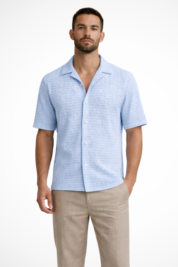 Button-up men's summer shirt, short sleeves, distinctive chevron texture, and an open collar.