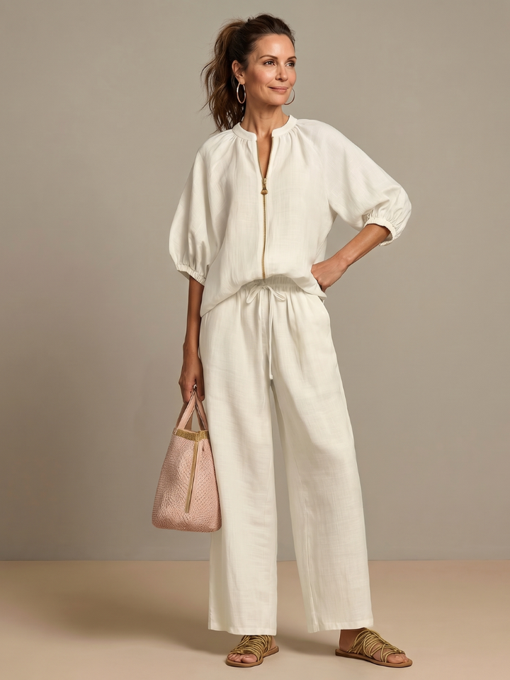 Elegant women's matching set: zip front long sleeve blouse & wide leg pants. Ideal for modern casual.
