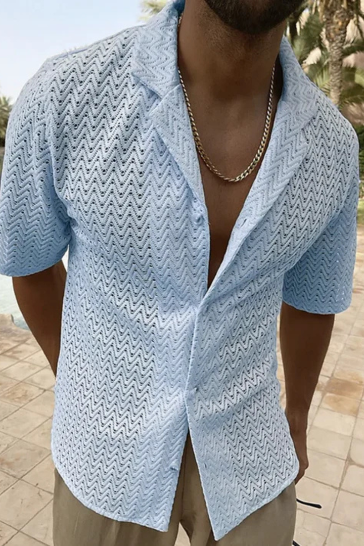 Stylish men's top for warm weather, short sleeve, open collar, and unique chevron textured fabric.