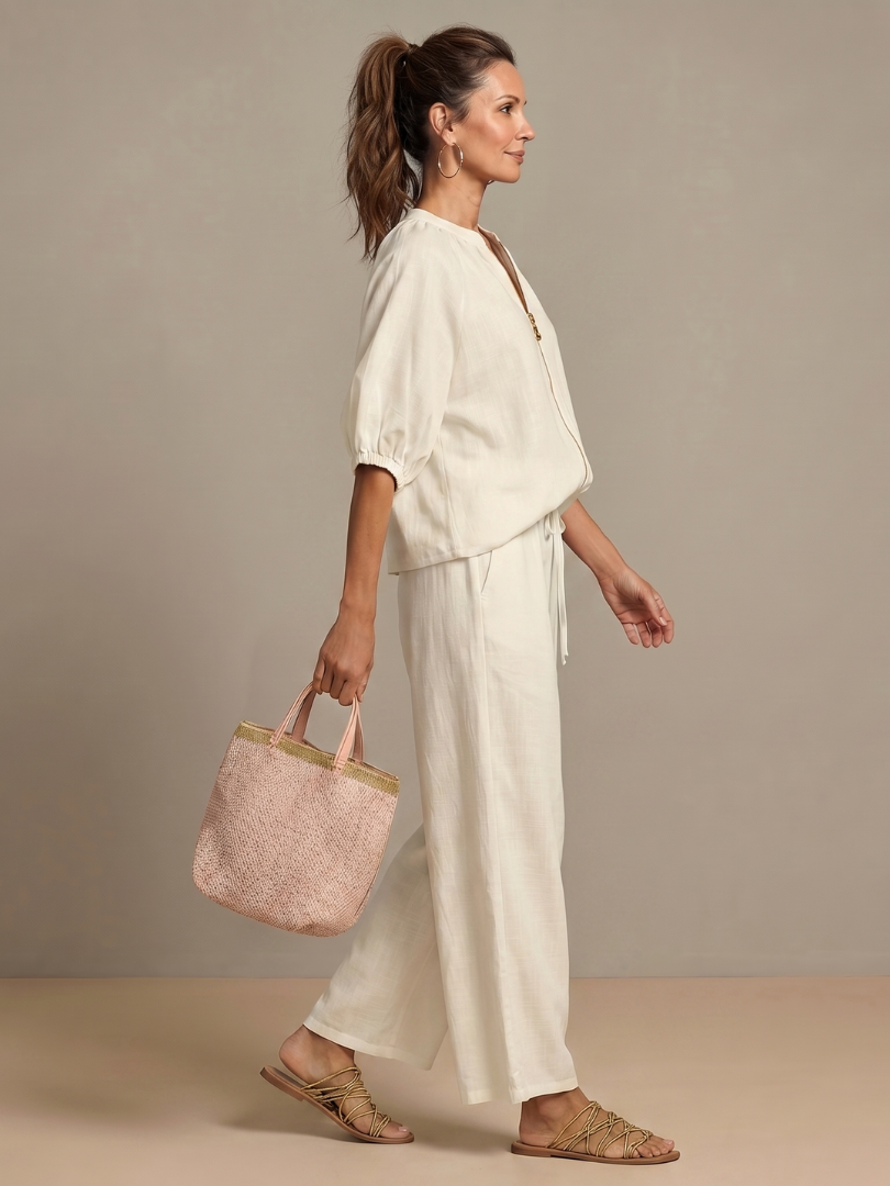 Versatile women's blouse & wide leg pant set with zip front. Perfect for comfortable spring/summer fashion.