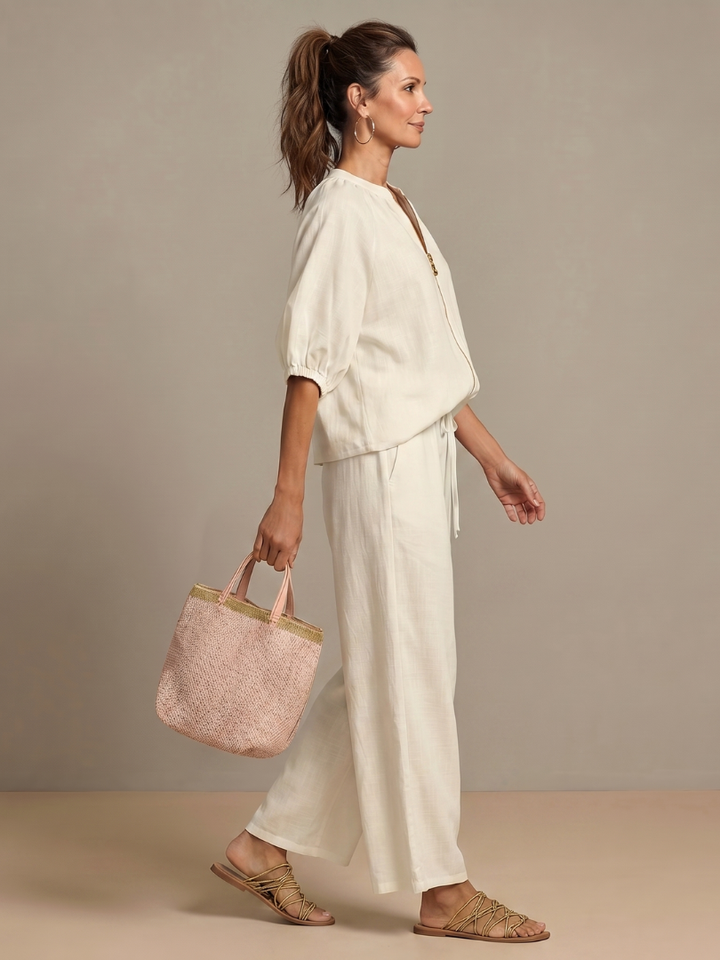 Versatile women's blouse & wide leg pant set with zip front. Perfect for comfortable spring/summer fashion.