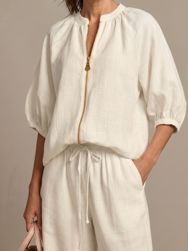 Women's zip front blouse and wide leg pant two-piece set. Relaxed, stylish, and comfortable for any day.