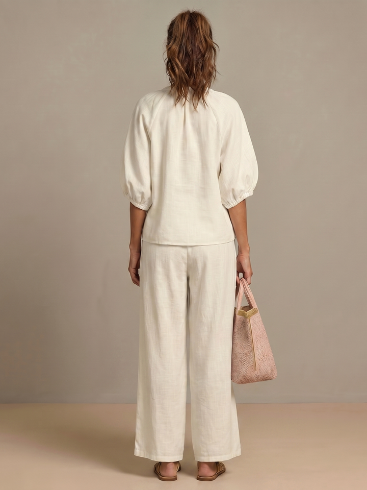 Chic women's zip front blouse & wide leg pant set. A comfortable spring/summer outfit for everyday wear.