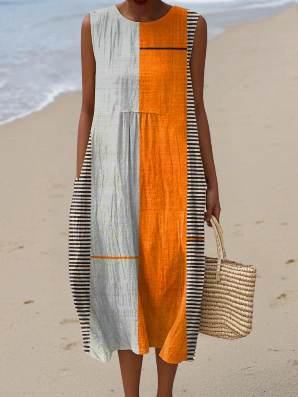 Elegant women's colorblock midi dress with flattering fit, perfect for chic casual summer style. Comfortable day dress.