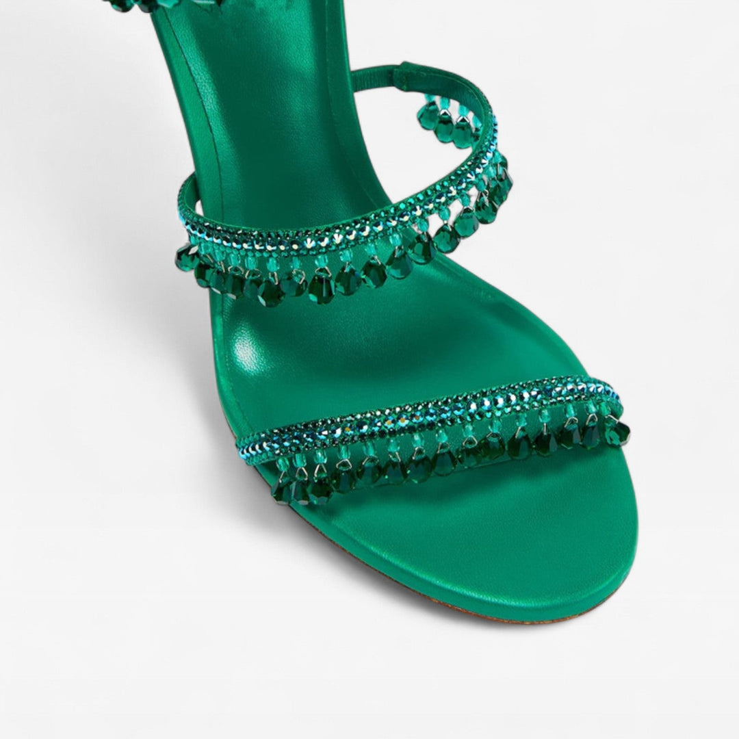 Stunning women's embellished high heel sandals, strappy and sparkling, perfect for formal events.