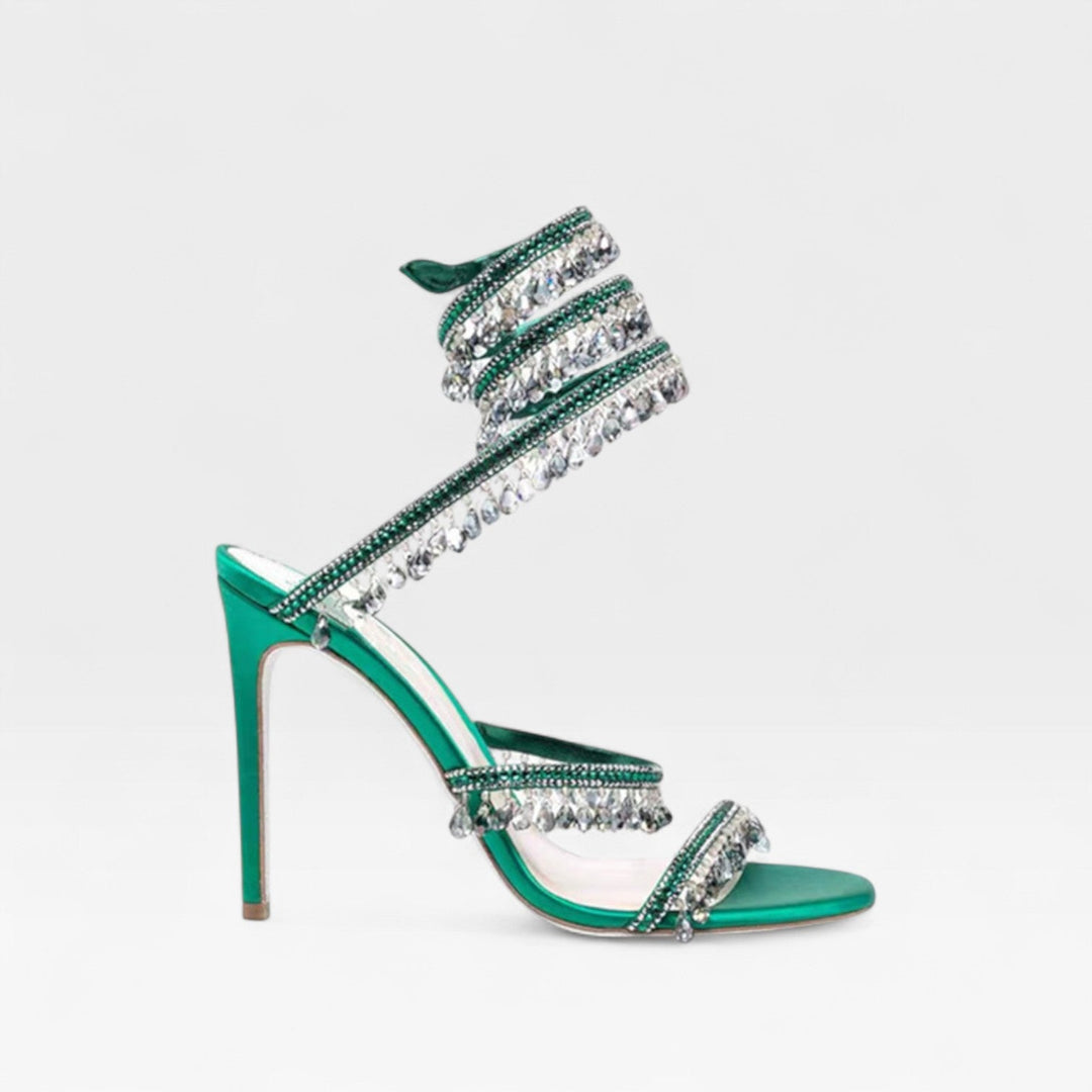 Exquisite women's sparkling strappy evening sandals, high heels for a glamorous party look.