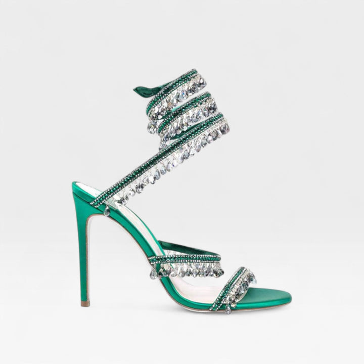 Exquisite women's sparkling strappy evening sandals, high heels for a glamorous party look.