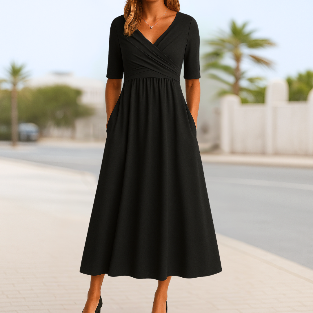 Comfortable & versatile women's short sleeve dress, ideal for casual spring or summer occasions. Midi length.