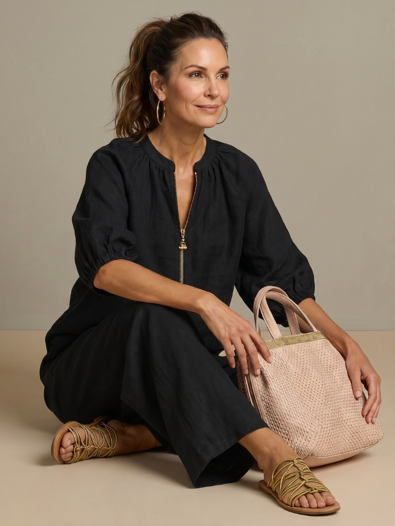 Stylish women's zip front blouse and wide leg pant set. Perfect for a relaxed, everyday chic look.