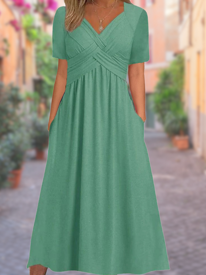 Comfortable women's V-neck summer dress with tummy control for a smooth, elegant, and versatile look. Spring fashion.