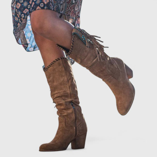 Stylish women's mid-calf boots, featuring a distinct fringe design and comfortable block heel for everyday elegance.