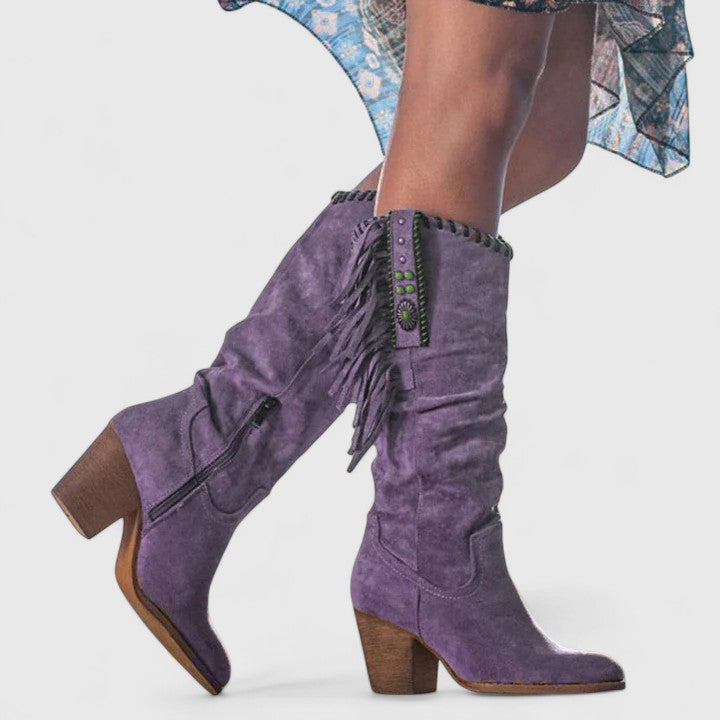 Elegant women's mid-calf boots featuring decorative fringe and a sturdy block heel, perfect for versatile wear.