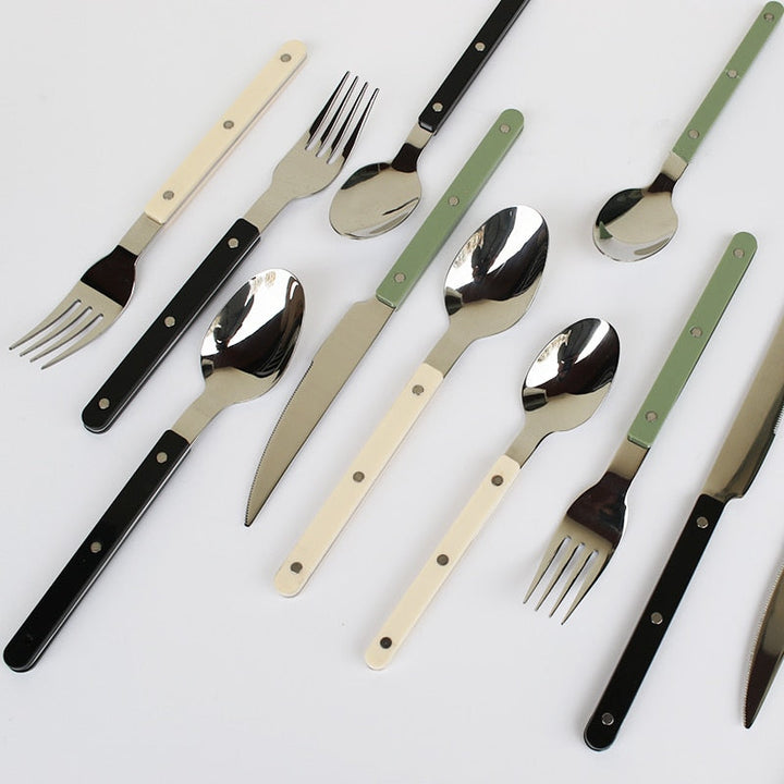 Elegant 24-piece stainless steel dining set, perfect modern flatware & cutlery for stylish meals.