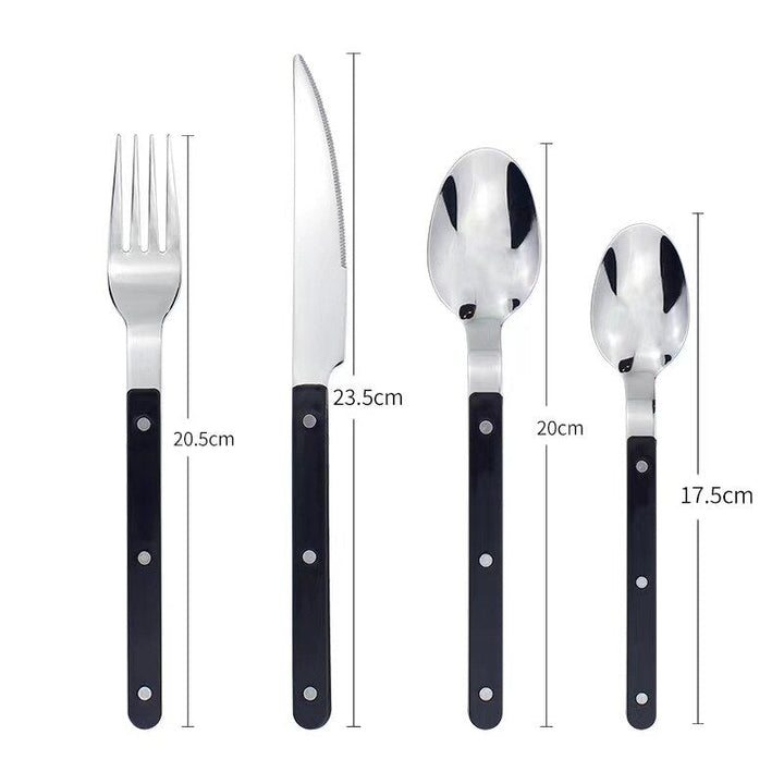 Detailed view of the handles on the elegant 24-piece stainless steel flatware set.