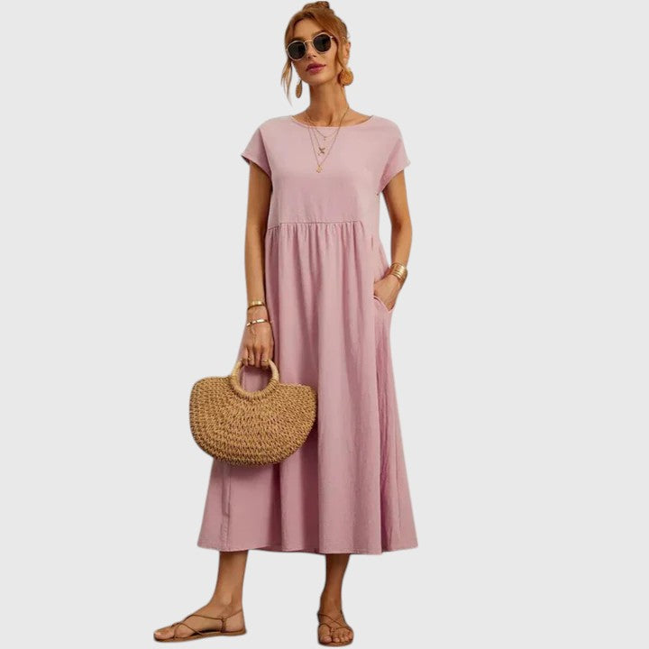 Comfortable & chic women's midi dress, easy everyday style with short sleeves & pockets for a relaxed fit.