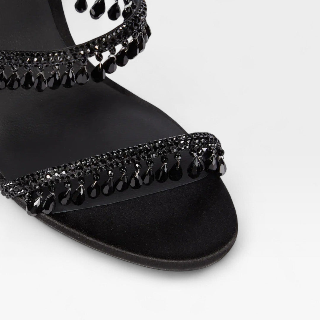 Fashionable women's strappy high heel sandals, sparkling and perfect for formal occasion wear.