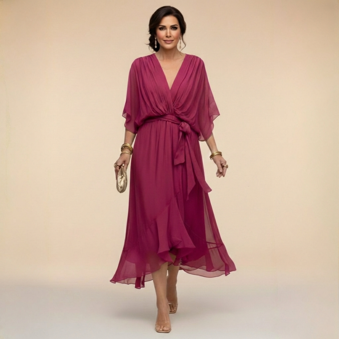 Women's V-neck dress featuring elegant flowy sleeves, a chic choice for any special occasion.