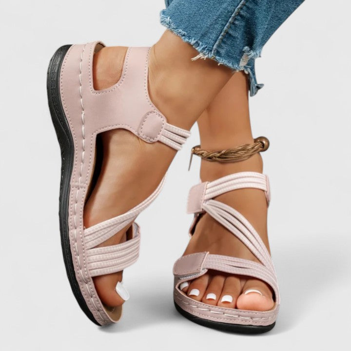 Stylish orthopedic sandals for women, designed for pain relief & posture correction. All-day comfort.