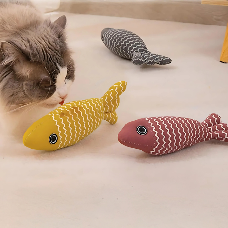 3-pack FinFrenzy catnip fish toys: red, yellow, gray. Interactive, durable, and stress-relieving fun for cats & kittens.