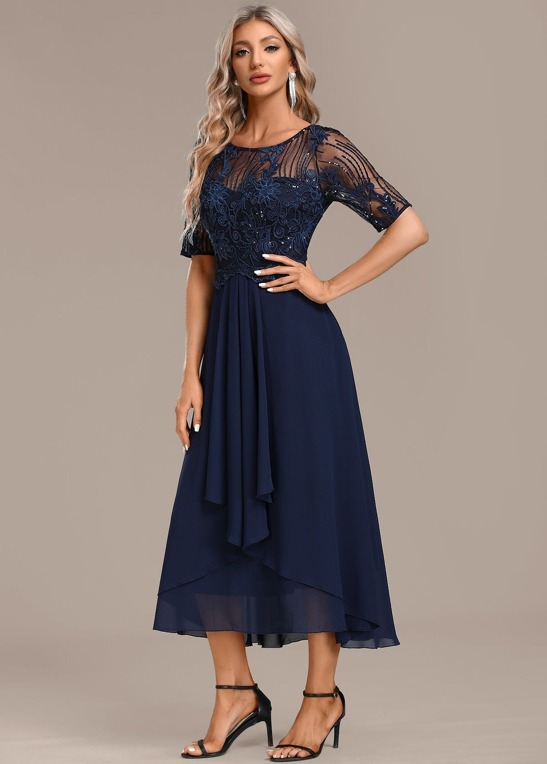 Women's navy short-sleeve lace midi dress, an elegant & flattering choice for evening or formal events.