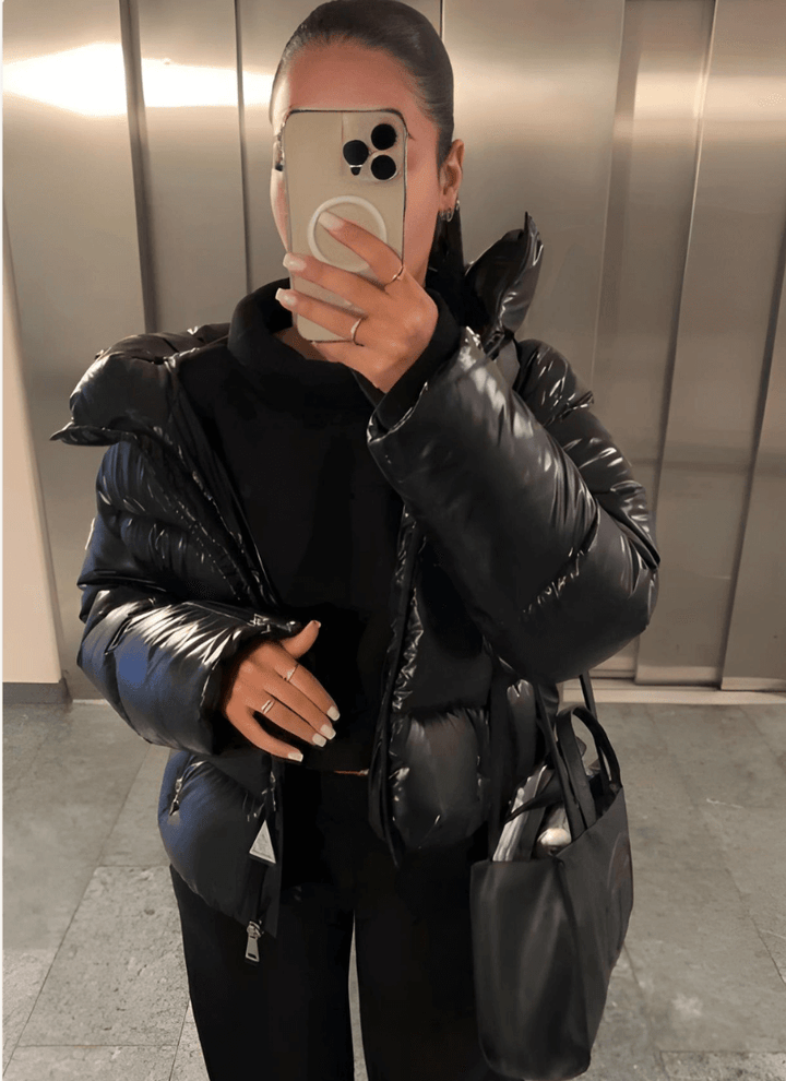 Women's slim-fit winter puffer jacket, designed for style and warmth. Ideal cold weather fashion apparel.