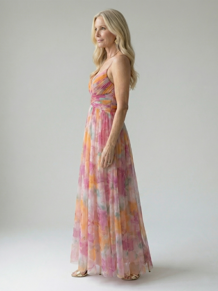 Flowy sleeveless wrap maxi dress in vibrant colors for women's summer vacation fashion.