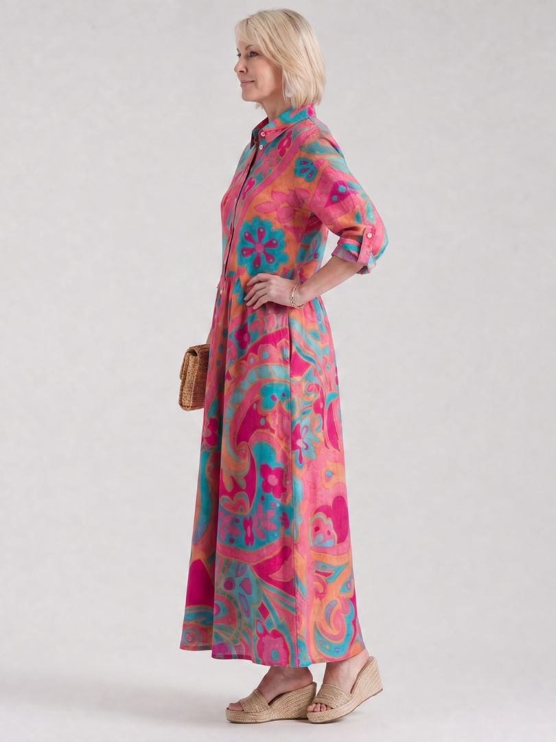 Comfortable women's printed collared midi dress, button front, 3/4 sleeves. Versatile for travel & everyday wear.