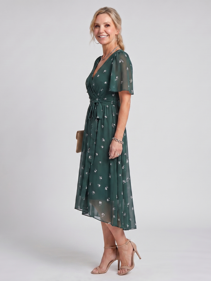 V-neck floral midi dress for women, featuring a comfortable gathered waist & pretty flutter sleeves.