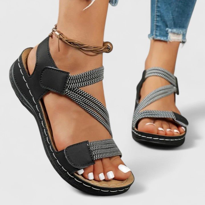 Supportive women's sandals offering superior arch comfort, ideal for long walks & daily activities.
