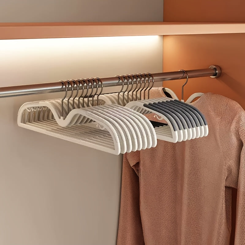 40 universal space-saving clothes hangers with non-slip design and 360° rotating hooks for efficient closet organization.