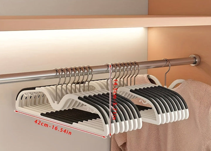 Value pack of 40 universal clothes hangers, space-saving, non-slip, and rotating hook design for closets.