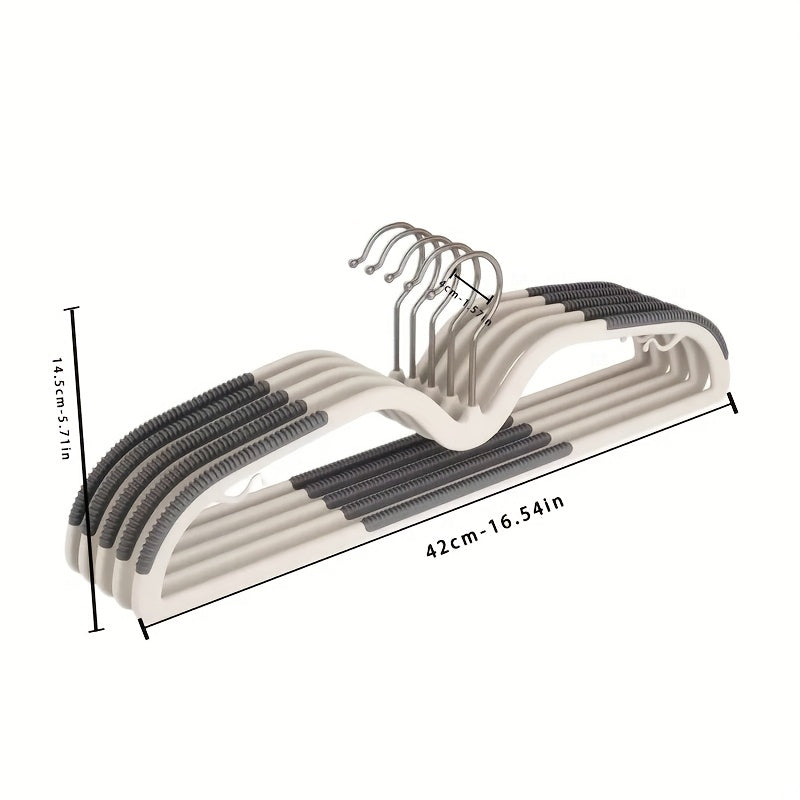 Durable plastic space-saving clothes hangers (40 pcs) with non-slip surface and rotating hook for neat storage.