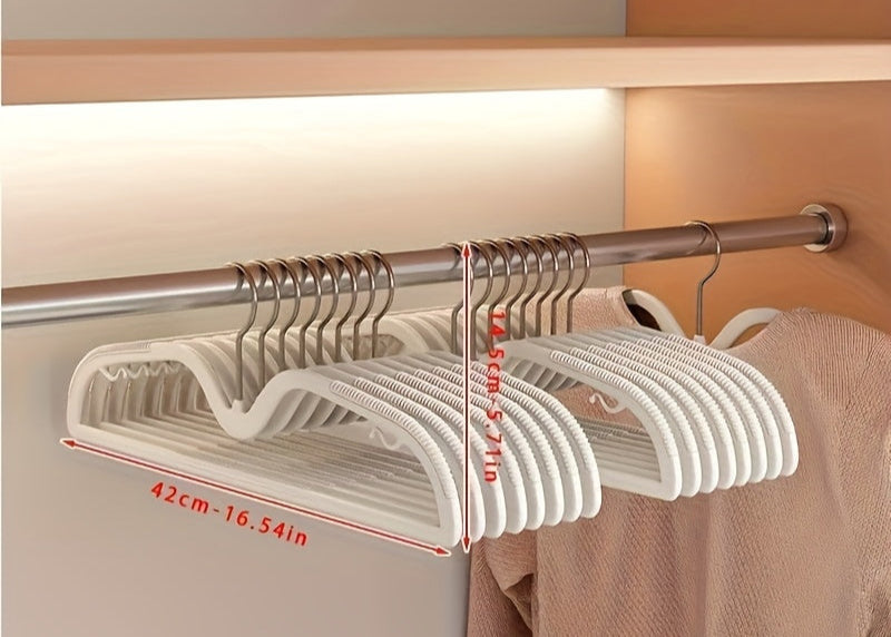 Universal space-saving clothes hangers (40-pack) with non-slip coating and rotating hook for versatile use.