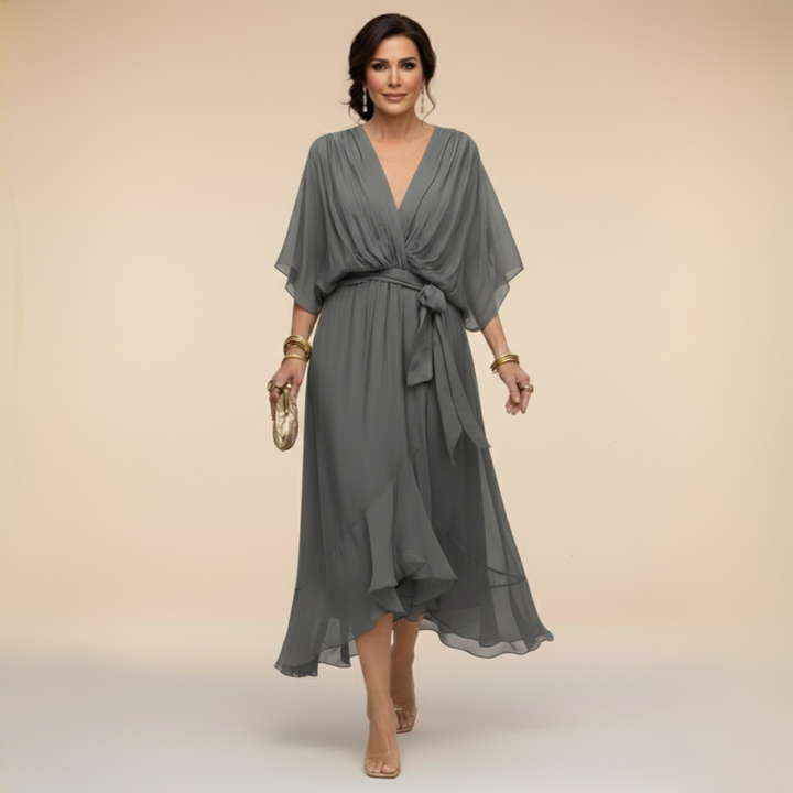 Party-ready women's V-neck midi dress with elegant flowy sleeves for special occasions.