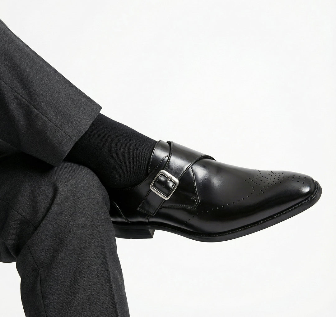 Elegant black slip-on loafers for gentlemen, Italian craftsmanship, sophisticated dress shoes.