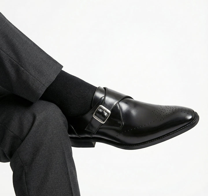 Elegant black slip-on loafers for gentlemen, Italian craftsmanship, sophisticated dress shoes.