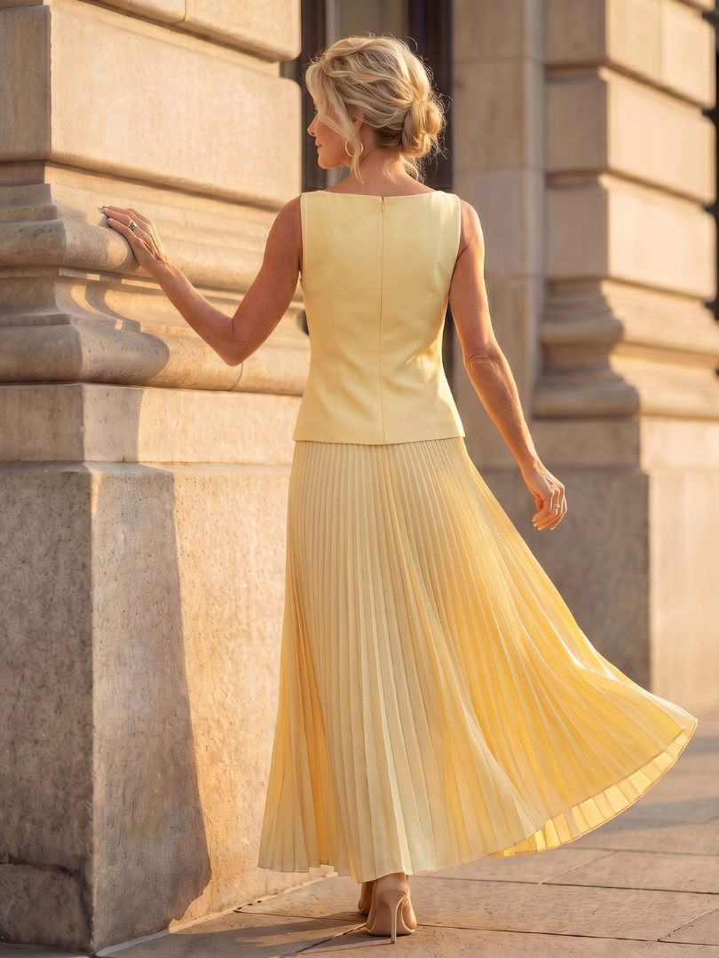 Formal women's structured bodice & pleated skirt set. A sophisticated two-piece outfit for special events.