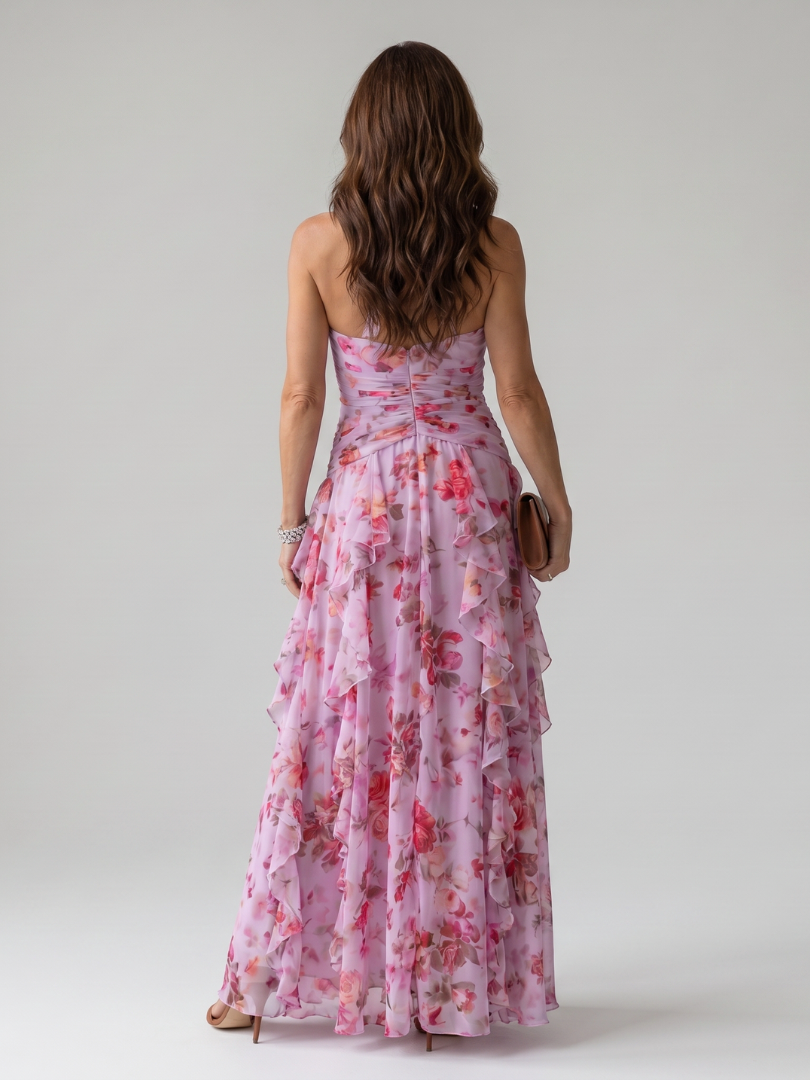 Stylish women's floral halter neck maxi dress with a ruched bodice & flowy ruffle skirt, ideal for beach & resort. [[lstfy-media:4]]