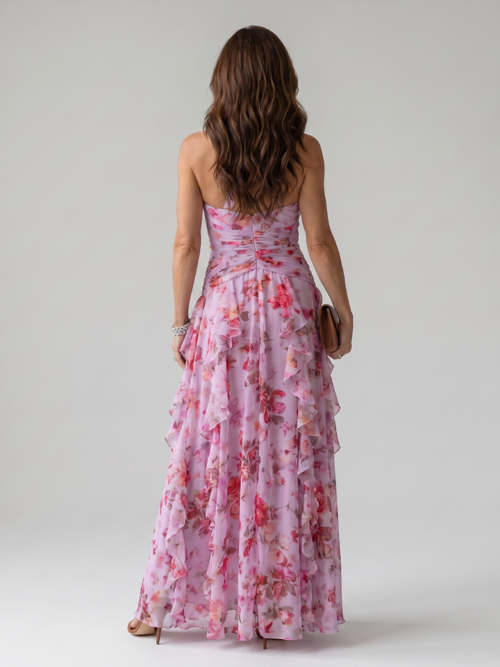 Stylish women's floral halter neck maxi dress with a ruched bodice & flowy ruffle skirt, ideal for beach & resort. [[lstfy-media:4]]