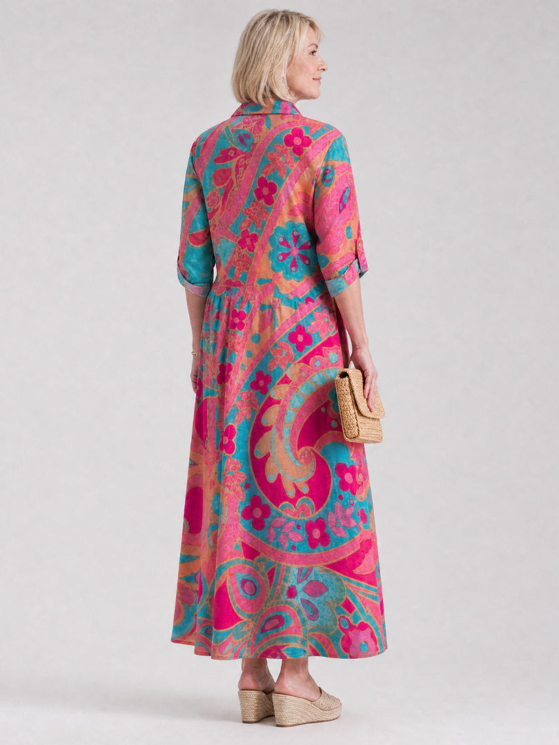 Elegant printed midi dress for women featuring button front, collar, and 3/4 sleeves. Ideal casual summer fashion.