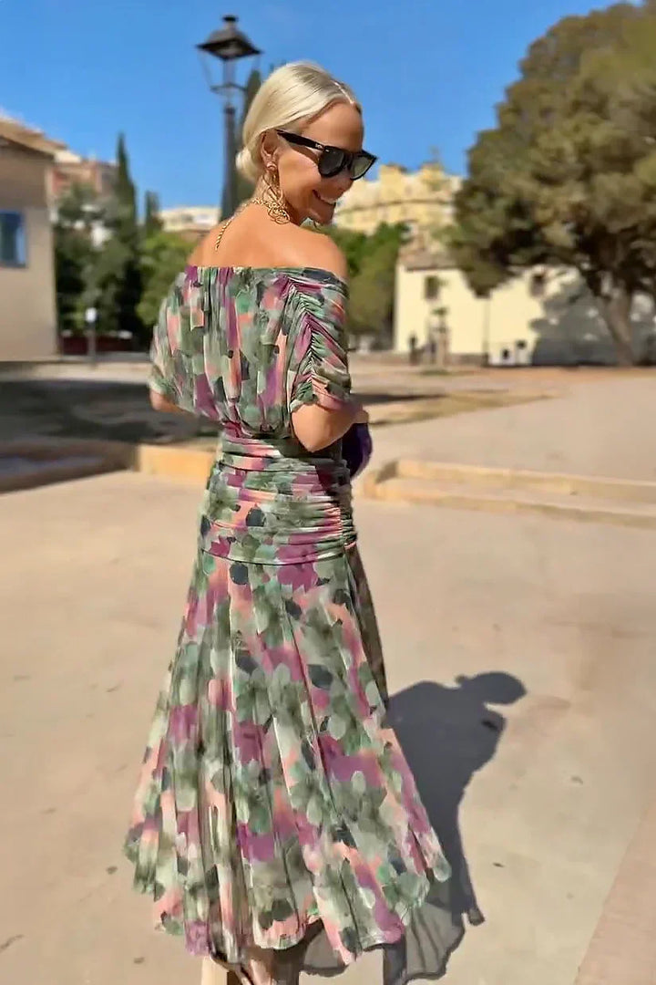 Women's elegant V-neck maxi party dress with a flowy design. Perfect evening gown.