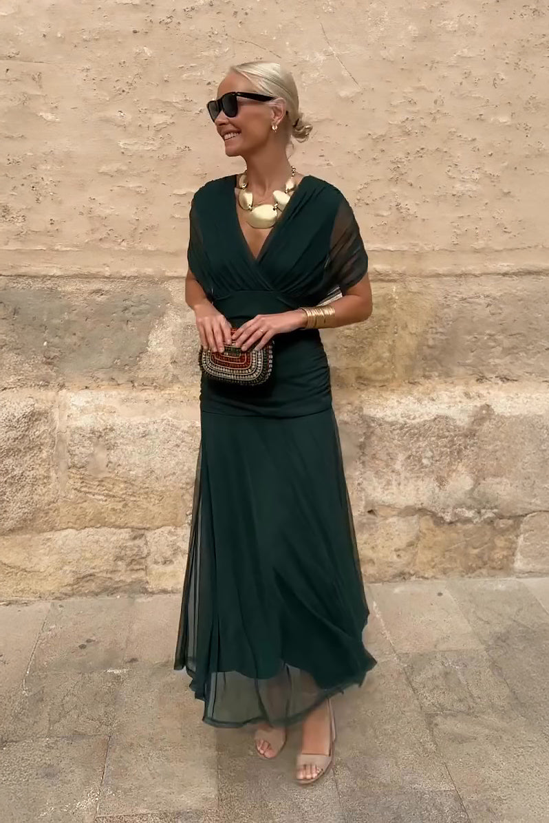 Elegant V-neck maxi dress for women, perfect for parties and formal events. Flowy evening gown.