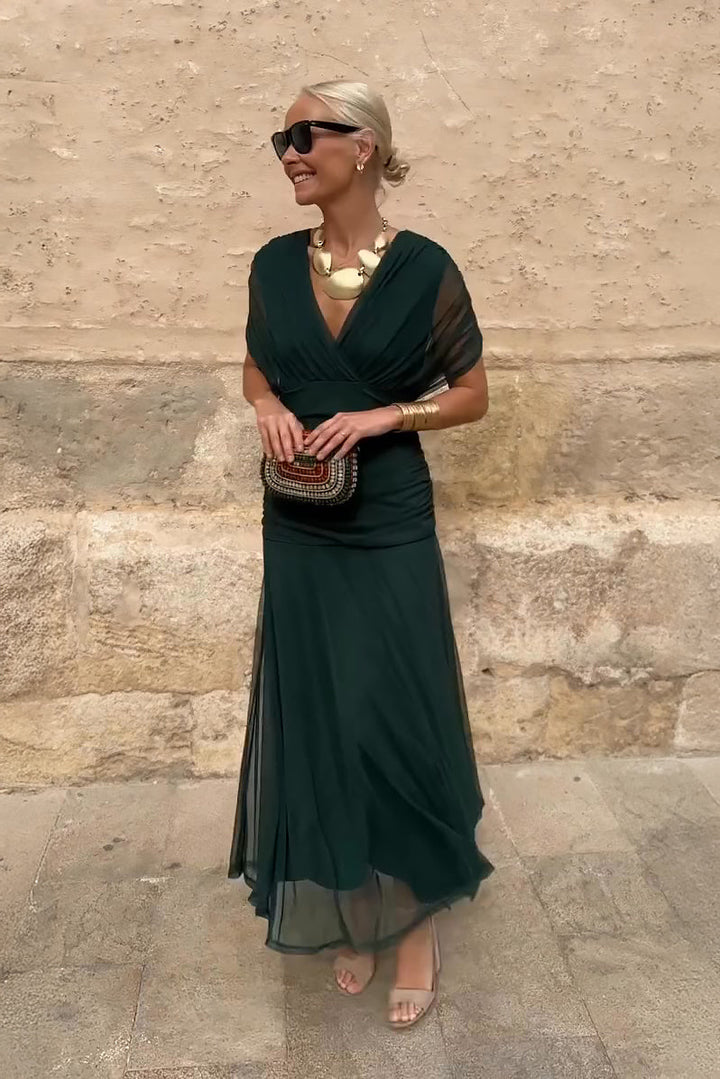 Elegant V-neck maxi dress for women, perfect for parties and formal events. Flowy evening gown.