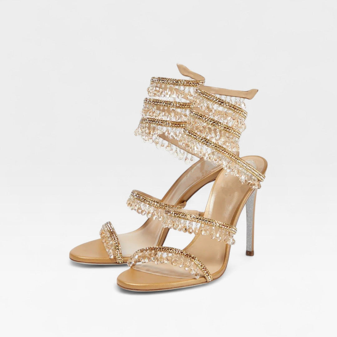 Dazzling women's high heel sandals, strappy with sparkling details, excellent for wedding guests.